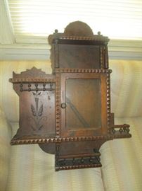 Ornate wall cabinet