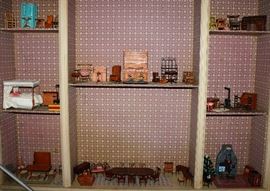 An amazing collection of custom made artist signed miniature furniture