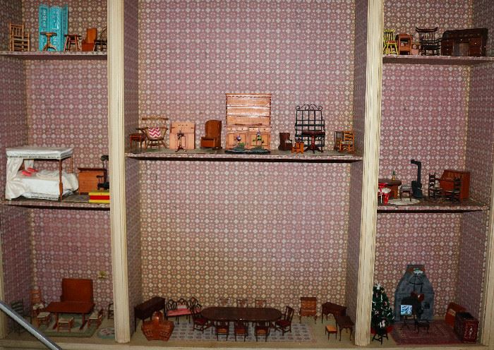 An amazing collection of custom made artist signed miniature furniture