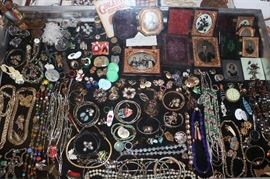 A very large selection of costume jewelry, dags and ambrotypes in cases