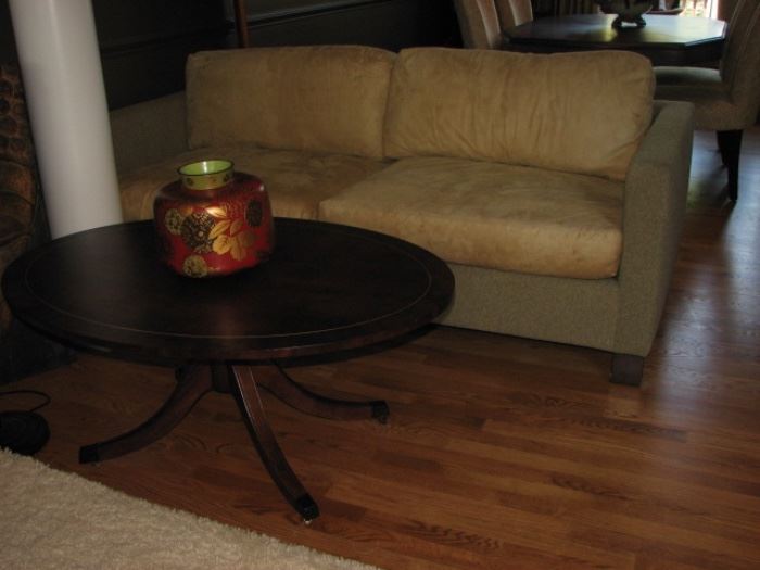 A. Rubin sofa, round coffee table