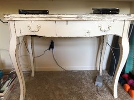 Vintage console table 
The top flips open to make a square table