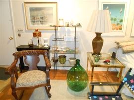 Green Glass Wine (Italy) carboy, heavy brass glass end table, carved wood rocker