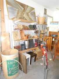 Modular metal grid panels with wood shelves/brackets , mounts to wall or can go to shows.