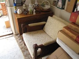 Mid Century Modern chair and stereo cabinet.