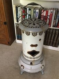 Antique enamel stove you can carry, great small side table with handle down