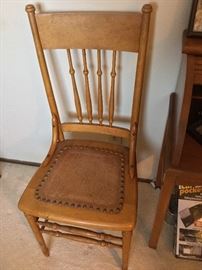 Side chair with nicely detailed leather seat