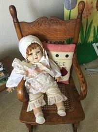 Sweet dolly in child’s chair