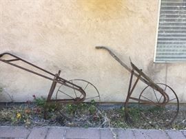 Old rusty plows for your lower 40, now that IS a workout!