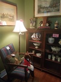 ANTIQUE OAK GLASS FRONT BOOK SHELF, CUSTARD GLASS , STEINS, HUNTING SCENE PRINTS, CHAIR AND FLOOR LAMP.