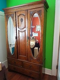 ANTIQUE DOUBLE MIRROR OAK ARMOIRE.