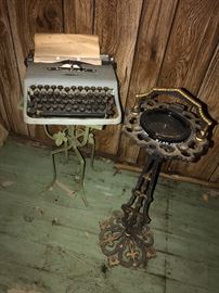 Vintage cast metal floor ash tray, typewriter