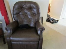Pair of leather recliners - small mar on arm