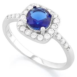 Blue sapphire and dia halo ring