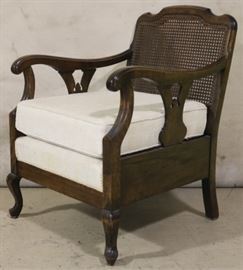 Vintage caned arm chair