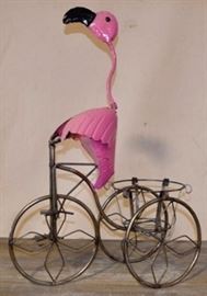 Flamingo on tricycle