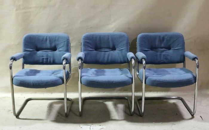Vintage tubular chrome armchairs