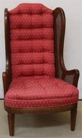 Vintage caned wing chair