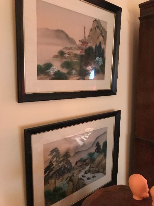 Pair of Asian painted on silk scenes