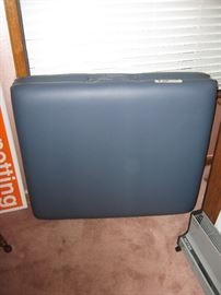 Massage table