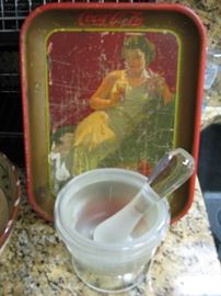 mortar and pestle and old coke tray