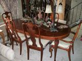 Cherry dining table w/ 6 chairs. Perfect condition.