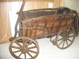 This goat cart originated from Chihuahua Mexico. It is well over 100 years old! Excellent condition for it's age!