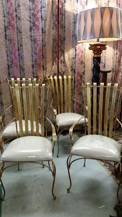 Set of four gold finished designer wrought iron chairs
