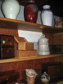 Pottery pieces and wood boxes