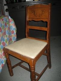 Antique chair with decorative back (1 of 5)
