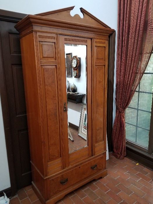 Vintage armoire - shelves have been added - note the drawer at the bottom.  A versatile piece.