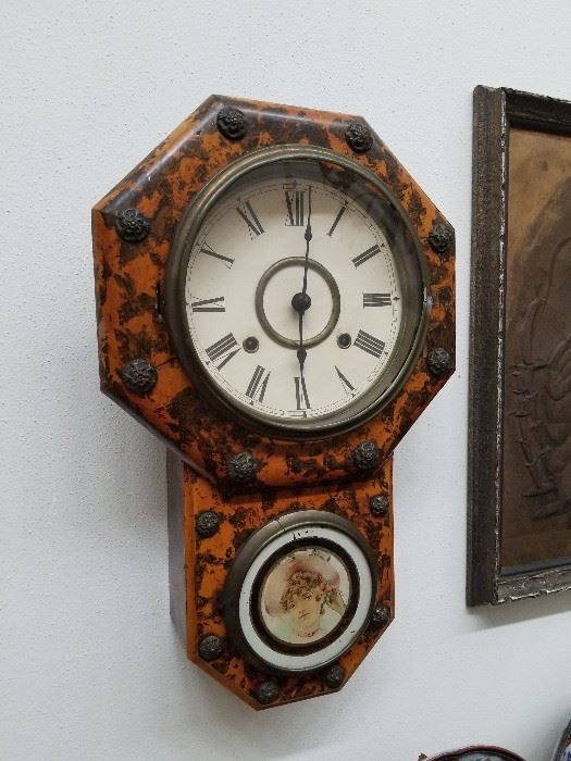 One of several antique clocks.