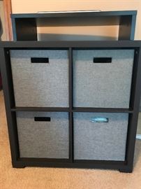 CUBE STORAGE WITH REMOVABLE MEDIA SHELVES 
