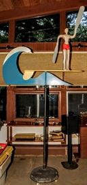 LARGE INDOOR MODERNIST WHIRLIGIG OF A SURFER BOY ON SURFBOARD AND RIDING A WAVE WOOD AND METAL WITH WEIGHTED BASE.  SIGNED NOTED ARTIST: JAMES WARREN 87