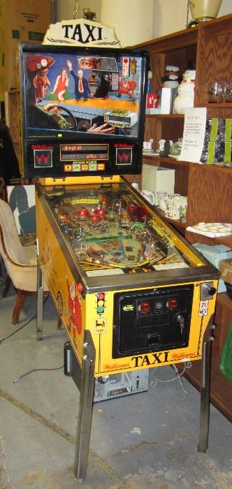 Williams Taxi pinball machine. Has keys and manual. Works. Currently set for free play