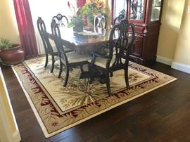 Offsite: Dining room set and area rug 8x10