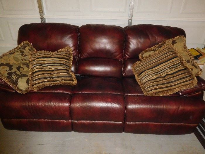 Leather sofa with electric recliners on both sides