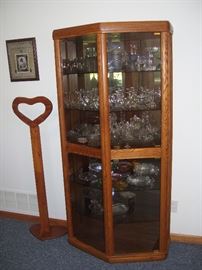Curio filled with glass.