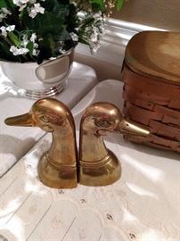 I have two sets of these brass duck head book ends!