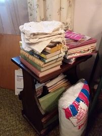 Magazine rack and books