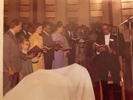 President Carter, wife, and child communion Zion Baptist Church 1977