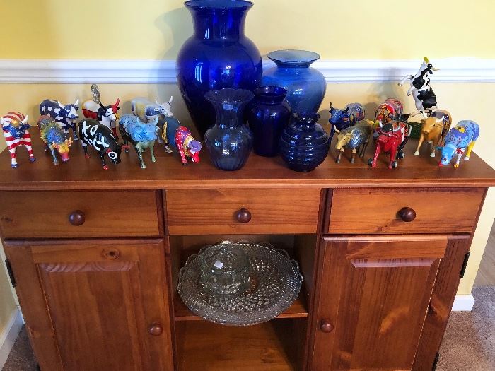 Cow Parade collection.  Wood buffet. Depression glass. 