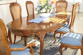 Dining table/6 chairs, pads and leaves.