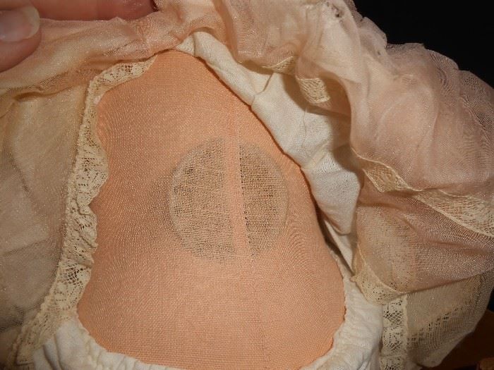 Madame Alexander doll with crier speaker in her back.