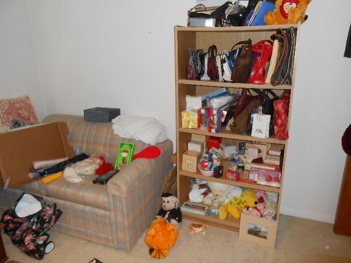 Many purses and stuffed animals