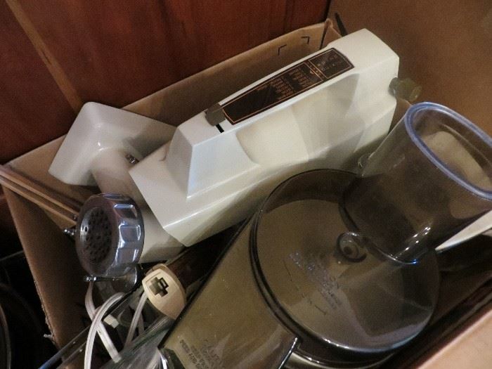 Oster stand mixer with all the attachments and 2 bowls, meat grinder, food processor, etc.