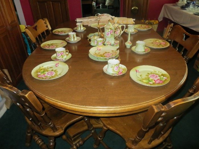 Dining table with 3 leaves and 6 chairs, Lefton china set.