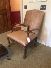 Lot 31: Highly Carved Armchair with Leather Upholstery