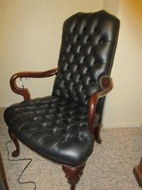 4 tufted leather arm chairs