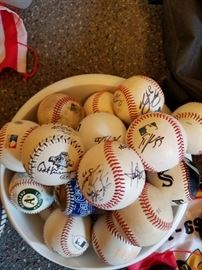 Autographed baseballs. Konerko, Fisk and Ortiz to name a few
